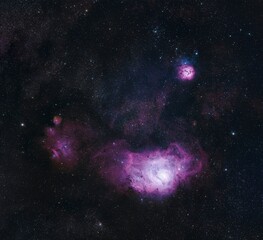 Deep space galaxy with glowing purple and pink nebulae and stars © IMRAN_IM33