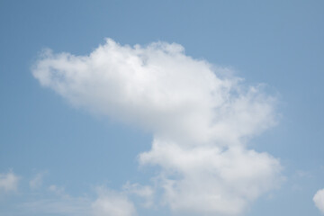 Fototapeta premium Beautiful blue sky with white clouds on a sunny day background