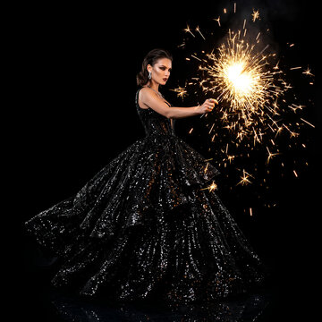 Elegant Woman in Sparkler Dress