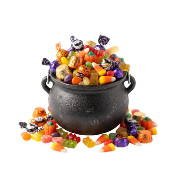 Black witch cauldron full of colorful halloween candy transparent background