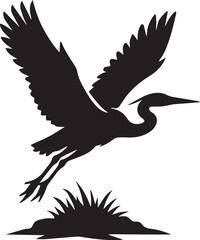 Fototapeta premium A majestic great blue heron taking flight from the marsh grass in a minimalist black and white silhouette