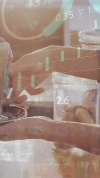 Animation of data processing over mid section of a woman taking a coffee at a cafe
