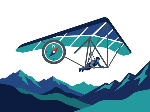 Hang glider pilot flying over mountains with compass