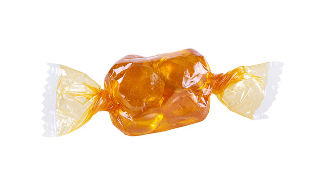 Amber hard candy wrapped in shiny cellophane, isolated on transparent background