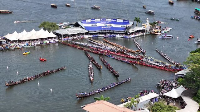 Experience the excitement of the Nehru Trophy Boat Race in Alappuzha, Kerala. Traditional Chundan Vallams, also known as snake boats, race through the beautiful Kerala backwaters as hundreds of rowers