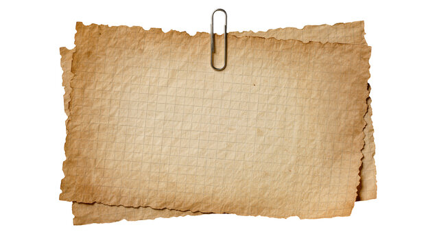Two sheets of aged torn grid paper held by a metal paperclip, isolated on transparent background