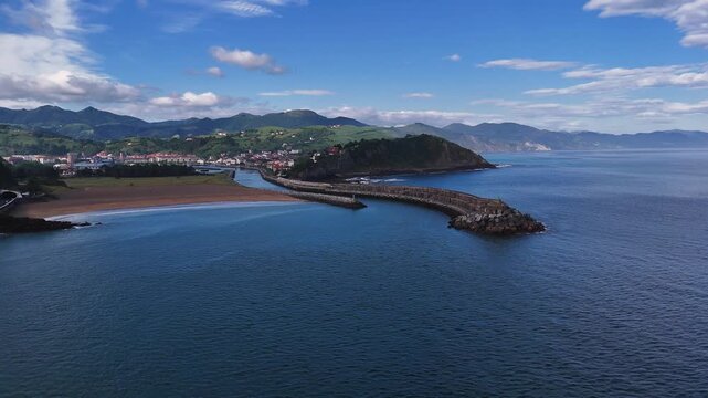 Aerial view of Urola river mouth to the Cantabric Sea and Zumaia village at Basque Country's coastline.
