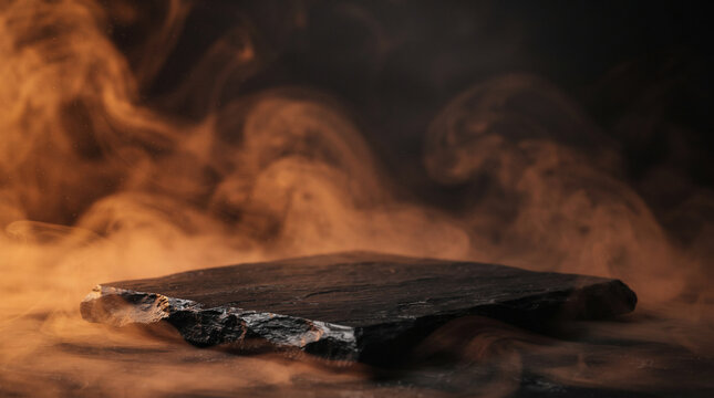 Dramatic canyon landscape with a winding road disappearing into the fiery sunset