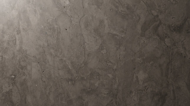 Close up of a dark gray textured wall made of small rectangular tiles