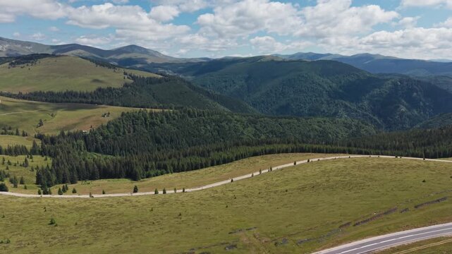 Winding Transalpina Above Deep Forest Valley