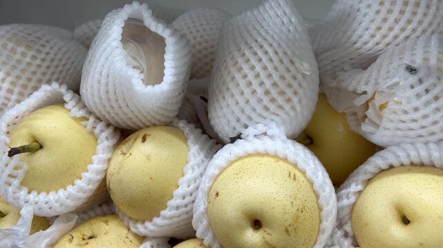 Cinematic Slow Motion of Sweet Golden Honey Pears for Healthy Fruit Ad