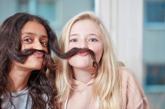 Portrait of two playful girls