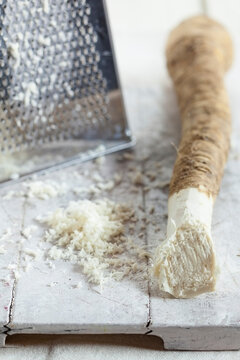 Grated horseraddish on wood