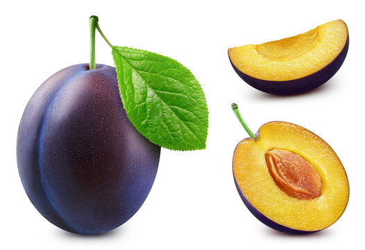 Plum leaves. Plum with slice isolated on white background. Clipping path Plum