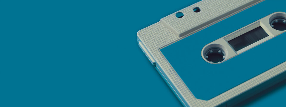 Retro Cassette Tape With Copy Space On Blue Background