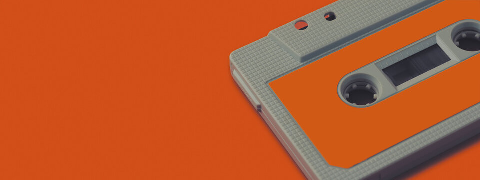 Retro Cassette Tape With Copy Space On Orange Background