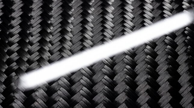 Carbon fiber 2x2 twill weave texture with high gloss clearcoat resin and specular light reflection