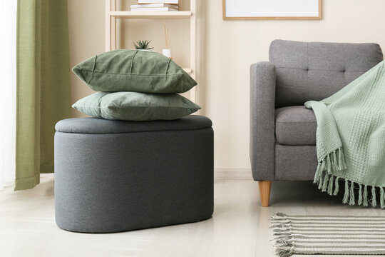 Home interior design and comfort, green pillows on a grey ottoman in a cozy living room with modern furniture and soft textiles for relaxation