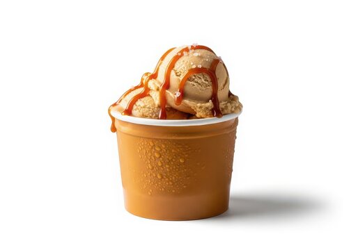 Delicious caramel ice cream with chocolate sauce in a cup isolated on white background