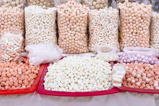 Traditional sheese - kurt dried dairy products displayed in abundance at an oriental bazaar in Bukhara, Uzbekistan. Ideal for travel, food culture, and Central Asian market content.**KEYWORDS:** ...