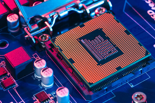 CPU microprocessor silicon chip installed inside motherboard socket next to BIOS components as a conceptual backdrop for hardware level cybersecurity AI technology infrastructure data processing