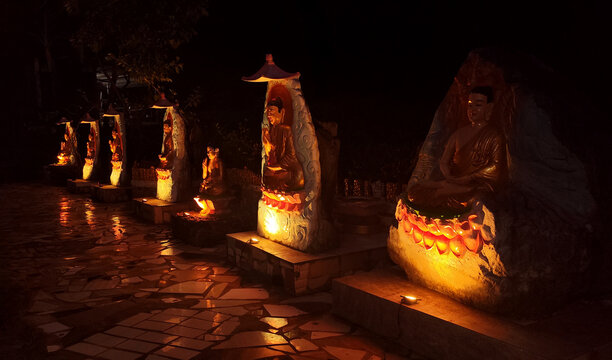 Statues at Chua Da Bao Pagoda in Nha Trang, Vietnam. Peaceful spiritual scene in a traditional temple at night time