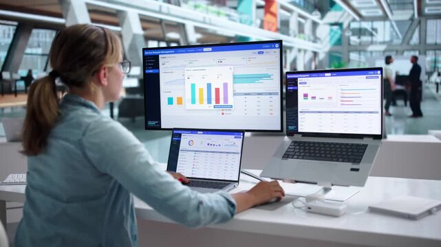 Facilities Manager Using Laptop