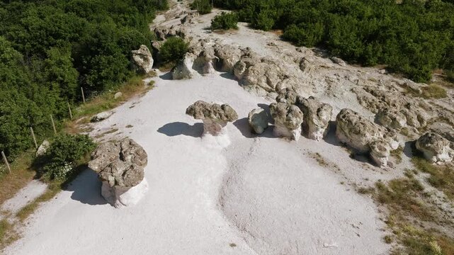 Aerial view Stone Mushrooms rock formations Kamenni Gabi natural phenomenon Kardzhali region Bulgaria travel destination hiking outdoor landscape drone