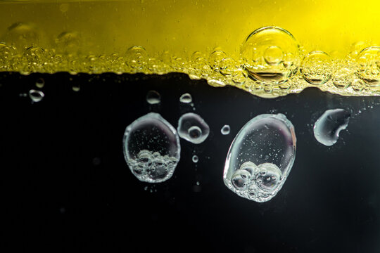Oil and water separating creating abstract liquid pattern