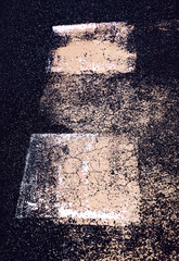 Abstract colorful composition on the asphalt