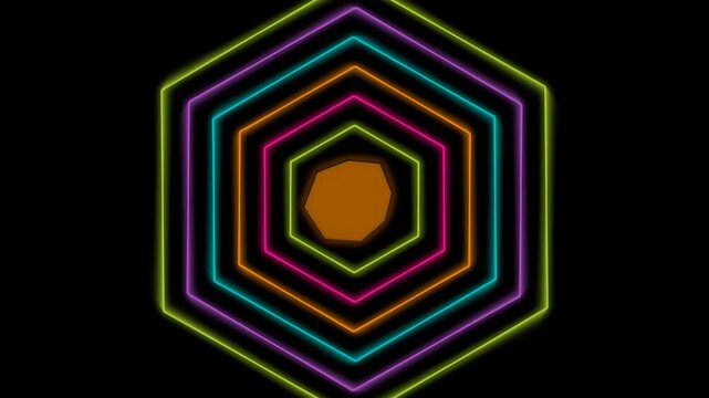 Abstract neon glowing colorful pentagon shapes forming a tunnel pattern on a dark black background 4k Motion Video