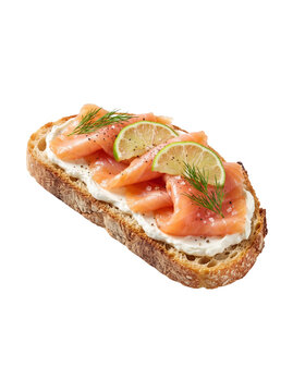A single rustic slice of toasted sourdough bread topped with a thick layer of cream cheese, folded slices of glossy smoked salmon, two thin lime wheels, and fresh sprigs of dill.