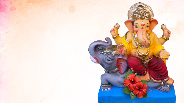 Beautiful Lord Ganesha idol riding an elephant with background