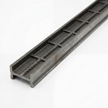 Generic precision cast iron I-beam straight edge bridge ruler isolated on white.