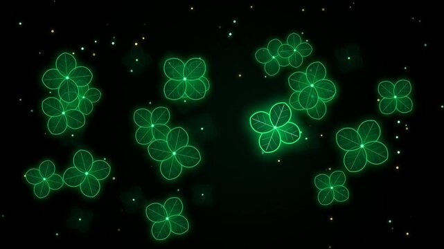 Glowing green four leaf clovers floating in dark space with sparkles for saint patricks day celebration 4k Motion Video