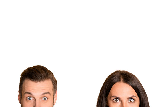 Photo of optimistic couple hide with empty space isolated on beige color background