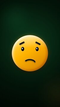 Sad yellow emoji face with downturned mouth and furrowed brows on dark background