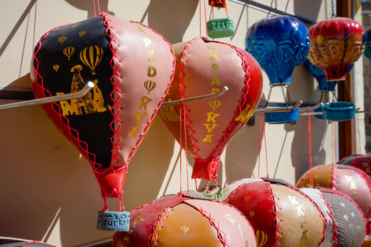Hot air balloon souvenirs hanging outside shop in Cappadocia