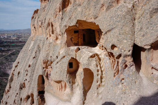 Panoramic view of fairy chimneys and rock-cut cave dwellings in Cappadocia