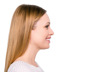 Profile portrait of charming pretty girl isolated on grey background with copy space empty place for product. Fashion beauty concept © deagreez