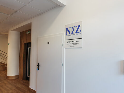 Gdansk, Poland - Jule 14, 2026: Hospital or clinic interior with informational signage Narodowy Fundusz Zdrowia NFZ (National Health Fund), professional healthcare facility directory marker