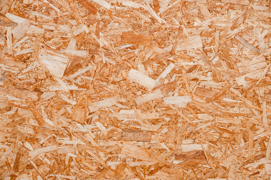 chipboard background, wooden plywood close-up