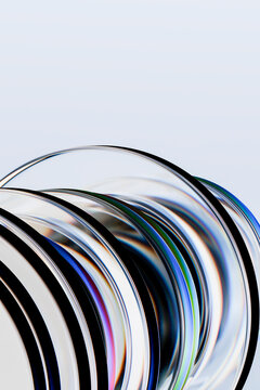 3D glass rings gray vertical copyspace form a cropped prismatic spiral with iridescent reflections and clean editorial space