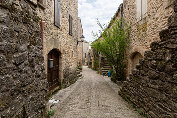 Fototapeta premium Stone alley in the historic village of La Couvertoirade, Aveyron, France