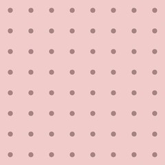Subtle polka dot pattern on a soft pink background for design © Syaima Levantine