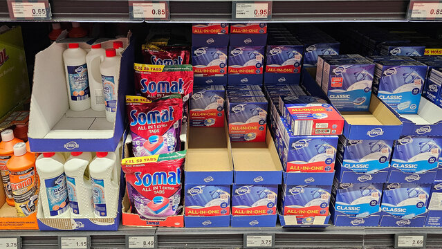 Cleaning products and dishwashing detergents on supermarket shelf