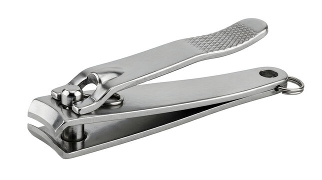Silver metal nail clippers with textured grip. Personal manicure and pedicure tool for nail trimming. Shoe or nippers with finger nail clipper. Cosmetic equipment for salon beauty care.
