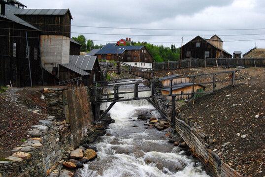 Historic copper mining buildings along the Hyttelva river in Roros, Norway