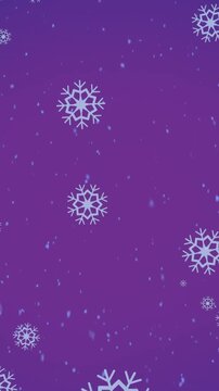 Animation of snow falling over christmas bell decoration and winter scenery