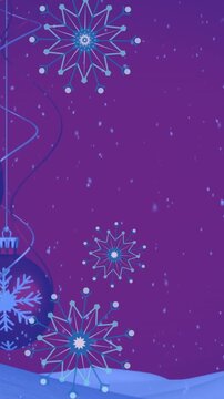 Animation of snow falling over christmas baubles decoration and winter scenery